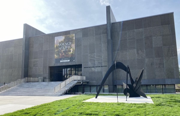 Munson front of building with Calder sculpture 