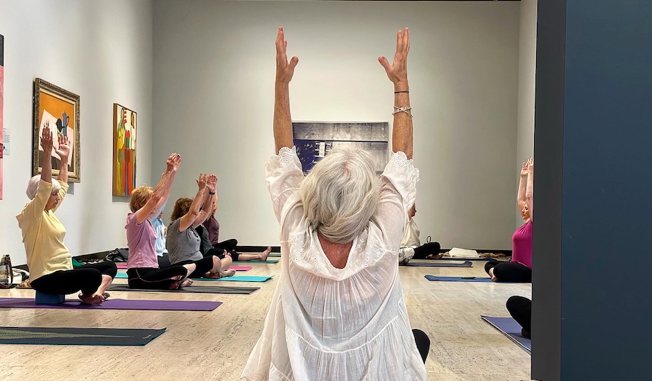 people doing yoga stretches