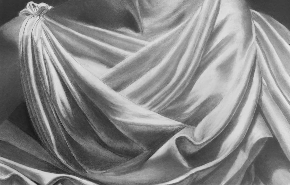 charcoal drawing of a draped female figure