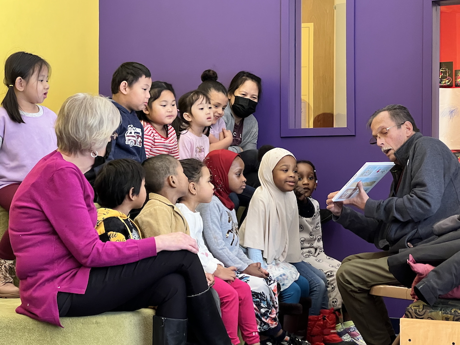 art story teacher reading to children